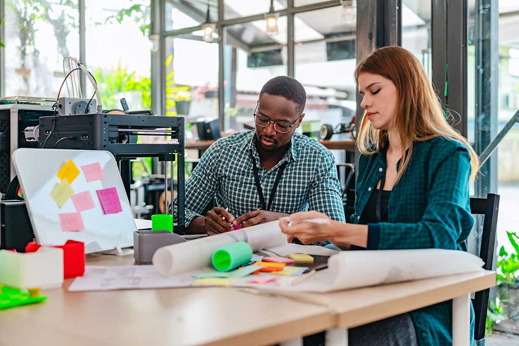 diverse-startup-team-working-on-3d-printing-projec-2025-07-21-19-30-23-utc